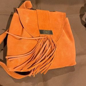 100% real leather. I have over 150 bags if you would like to see other options